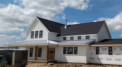 dark metal roof white house|white house with galvalume roof.